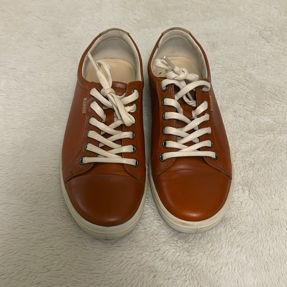 Red Ecco sneakers.